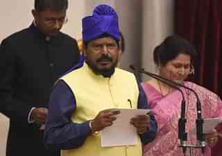 

Indian member of Parliament Ramdas Athawale takes the oath during the swearing-in ceremony of new ministers following Prime Minister Narendra Modi’s cabinet re-shuffle, at the Presidential Palace in New Delhi on July 5, 2016. Indian Prime Minister Narendra Modi revamped his cabinet on July 5 bringing in 19 new junior ministers to speed up decision-making and delivery on promises made in this year’s budget. / AFP / Prakash SINGH (Photo credit should read PRAKASH SINGH/AFP/Getty Images)