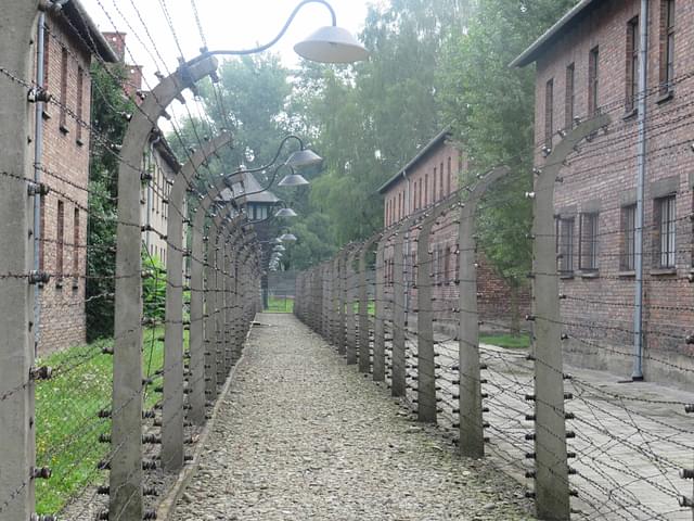 Barbed fences across the vast auxiliary concentration camp at Birkenau.