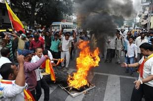 Pro-Karnataka activists shout slogans and burn an effigy of Tamil 
Nadu chief minister, J Jayalalithaa as the Cauvery water dispute has 
taken a violent turn (
STRINGER/AFP/Getty Images)
