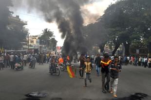 Protesters burn tyres as they blockade traffic on a major
connecting road during a statewide strike in Bangalore over the Cauvery water
issue. Photo credit: MANJUNATH KIRAN/AFP/GettyImages 