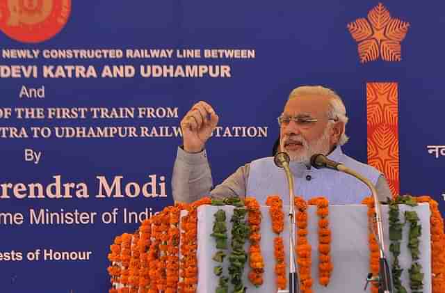 Prime Minister Narendra Modi speaks during the inauguration ceremony at Katra railway station, 45 km from Jammu. Photo credit: STR/AFP/GettyImages