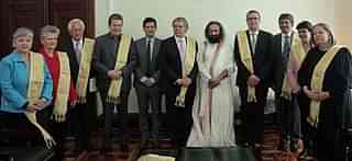 Sri Sri Ravi Shankar with Santos, sixth from left, at the Colombian Parliament: Photo credit: Art of Living