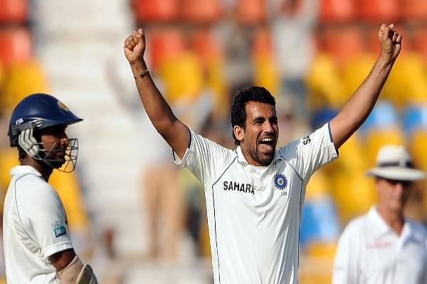 Indian cricketer Zaheer Khan (C) celebrates after taking the wicket of Sri Lankan cricketer Kumar Sangakkara (L) (INDRANIL MUKHERJEE/AFP/Getty Images)