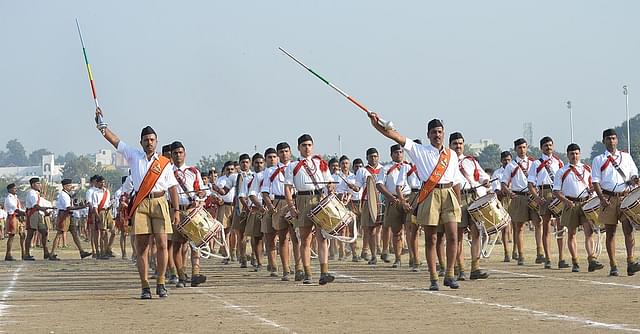 <b>RSS cadets perform a
drill during Vijaya Dashmi. Photo credit: STR/AFP/GettyImages</b>