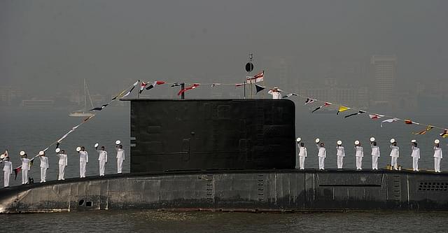 Indian sailors stand on the deck of a submarine during a fleet
review in Mumbai. Photo credit: PUNIT PARANJPE/AFP/GettyImages.&nbsp;