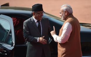 Indian Prime Minister Narendra Modi gestures while talking with Prime Minister of Nepal (Photo By:
PRAKASH SINGH/AFP/Getty Images)