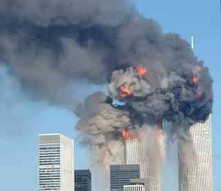 The World Trade Center buildings on fire after being hit by
two planes on 11 September 2001, in New York. Photo: Spencer Platt/GettyImages. &nbsp; &nbsp; &nbsp;