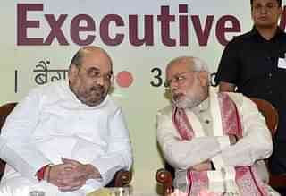 Amit Shah and Narendra Modi. Photo credit: MANJUNATH KIRAN/AFP/GettyImages