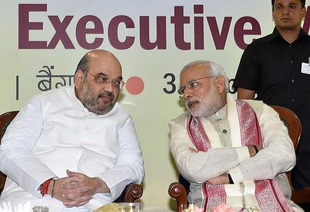 Amit Shah and Narendra Modi. Photo credit: MANJUNATH KIRAN/AFP/GettyImages