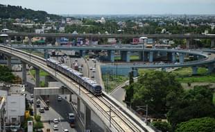 A Chennai Metro Rail train travels along the track between
the airport and Little Mount in Chennai. Photo credit: ARUN SANKAR/AFP/GettyImages