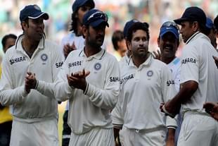 Rahul Dravid (R) being applaud by teammates Sachin Tendulkar (3R), Mahendra Singh Dhoni (2L) and VVS Laxman (L) after Dravid won a ‘man of the match’ award (PUNIT PARANJPE/AFP/Getty Images)