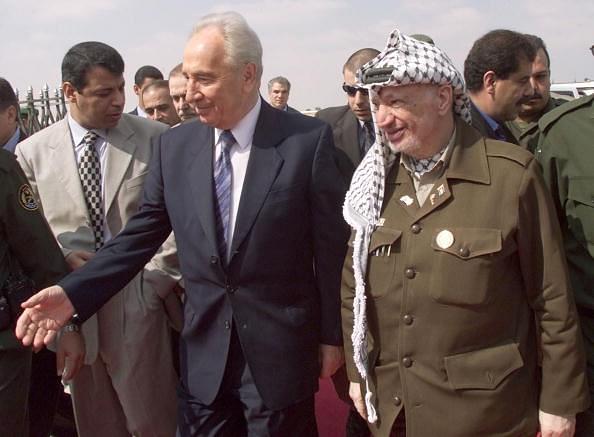 Shimon Peres and 
Yasser Arafat 

