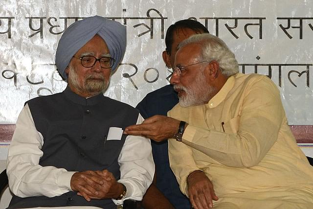 Manmohan Singh (L) and Narendra Modi (SAM PANTHAKY/AFP/Getty Images))&nbsp;