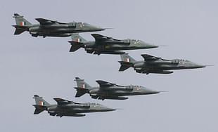 Five Jaguar aircrafts in an arrowhead formation
 of the Indian Air Force fly over the Yehlanka Airforce Base. (Photo Credit: INDRANIL MUKHERJEE/AFP/Getty Images)