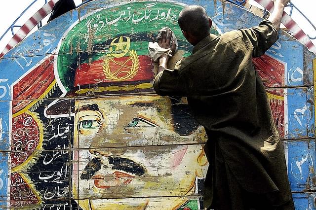 An Ayub Khan illustration on a truck (ARIF ALI/AFP/Getty Images)
