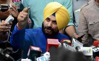 Sidhu addresses the media outside his residence. Photo
credit: MONEY SHARMA/AFP/GettyImages &nbsp; &nbsp; &nbsp;