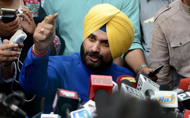 Sidhu addresses the media. (MONEY SHARMA/AFP/GettyImages)
