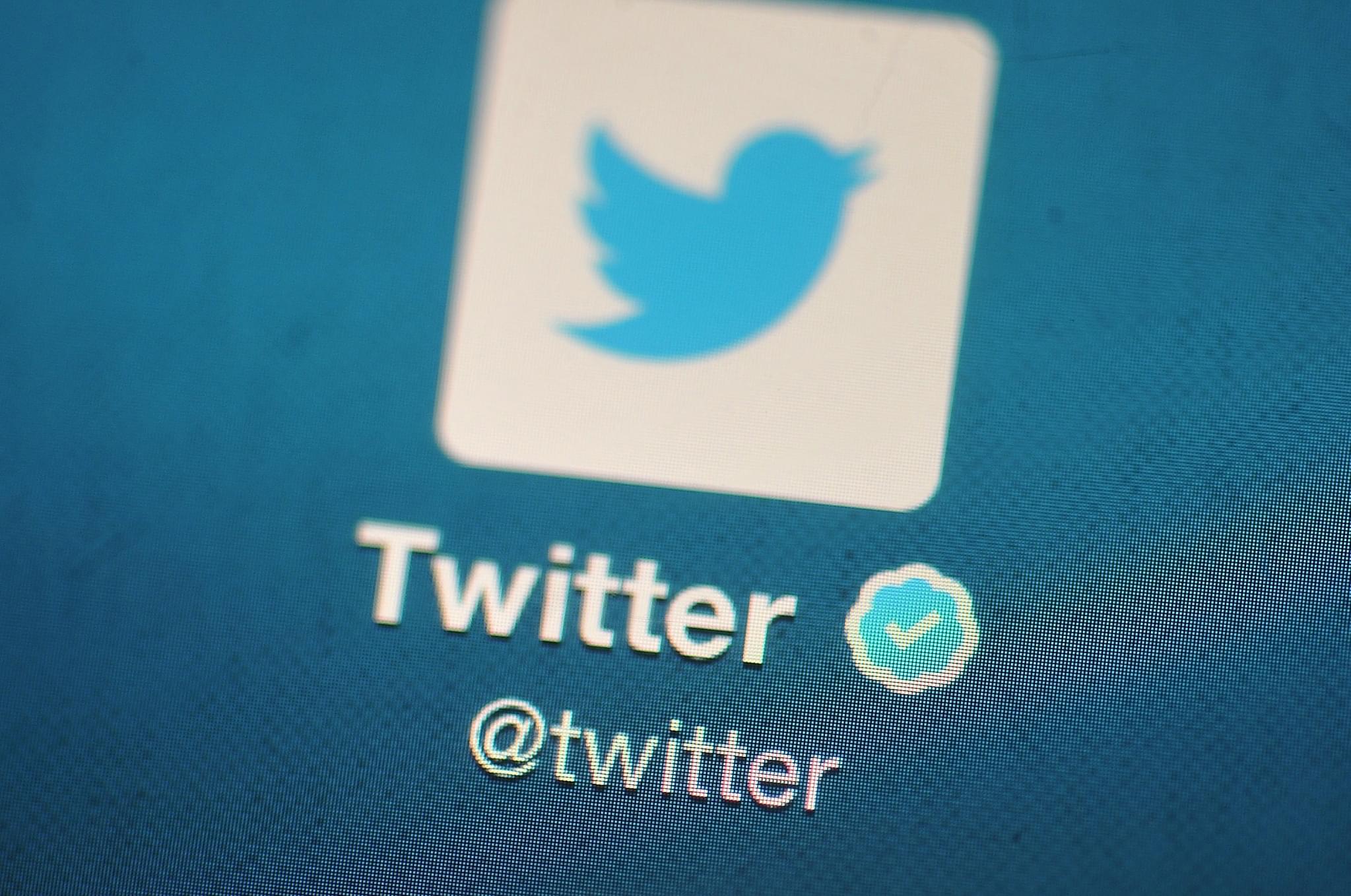 The Twitter logo is displayed on a mobile device. (Bethany Clarke/Getty Images) 