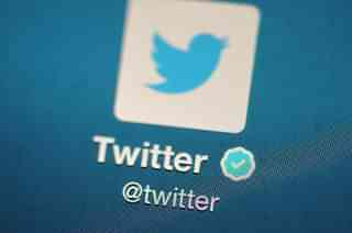 The Twitter logo is displayed on a mobile device (Bethany Clarke/Getty Images) 