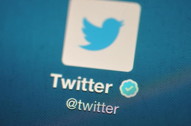 The Twitter logo is displayed on a mobile device. (Bethany Clarke/Getty Images)