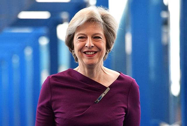 May at the
Conservative Party Conference in Birmingham, England.  Photo credit: 
Carl Court/GettyImages