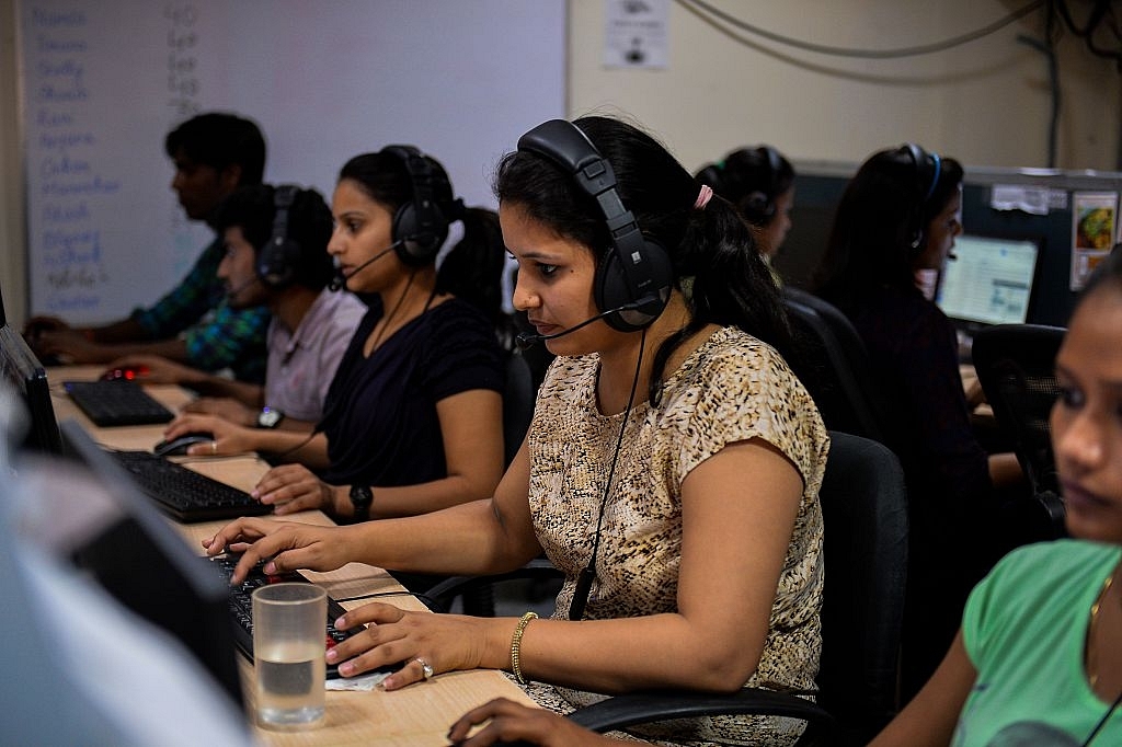 An Indian woman works at a call centre in Noida. (CHANDAN KHANNA/AFP/Getty Images)