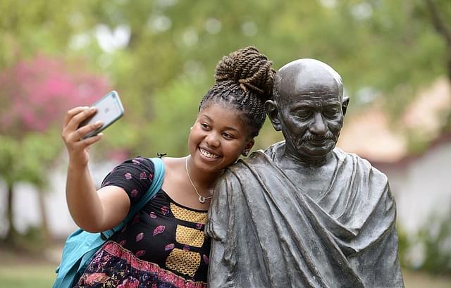 Selfie with Gandhi (SAM PANTHAKY/AFP/Getty Images)