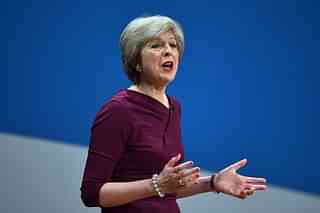 May delivers a speech during the fourth day of the Conservative Party Conference at the ICC Birmingham. Photo credit: Carl Court/GettyImages