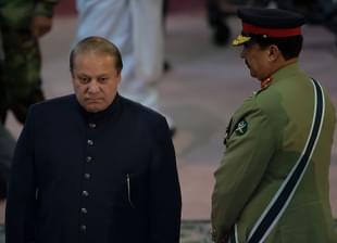 Pakistani Prime Minister Nawaz Sharif (L) walks past army chief 
Raheel Sharif. (Photo Credit: AAMIR QURESHI/AFP/GettyImages)