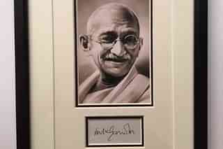 Framed Gandhi photo with his signature