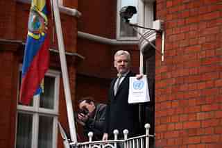
Wikileaks founder Julian Assange 
speaks from the balcony of the Ecuadorian embassy. Photo By: Carl Court/Getty Images)

