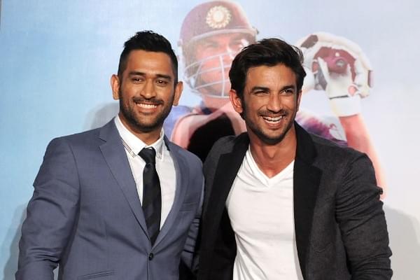 Sushant Singh Rajput (R) and Mahendra Singh Dhoni pose during the trailer launch in Mumbai of the biographical film ‘MS Dhoni: The Untold Story’ (STR/AFP/Getty Images)