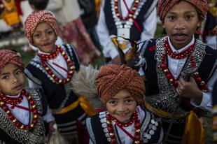 Tribal Khasi boys dressed in traditional costume (Daniel Berehulak /Getty Images)