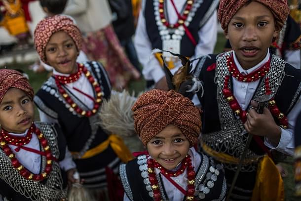 Tribal Khasi boys dressed in traditional costume (Daniel Berehulak /Getty Images)