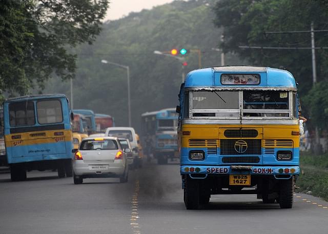 Black fumes smoke from a bus in Kolkata  (Photo Credit: DESHAKALYAN CHOWDHURY/AFP/Getty Images)