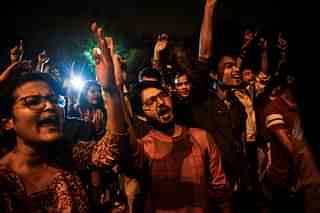 JNU students and activists shout slogans during a rally. Photo credit: CHANDAN KHANNA/AFP/GettyImages