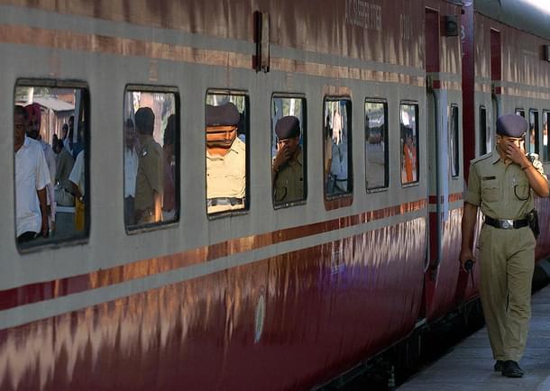 A policemen walks past the Rajdhani
Express prior to it’s departure from a station in Kolkata. Photo credit: DESHAKALYAN CHOWDHURY/AFP/GettyImages