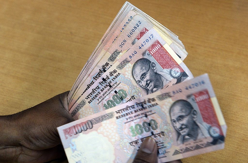 Rs 1,000 notes in old Indian currency (INDRANIL MUKHERJEE/AFP/Getty Images)