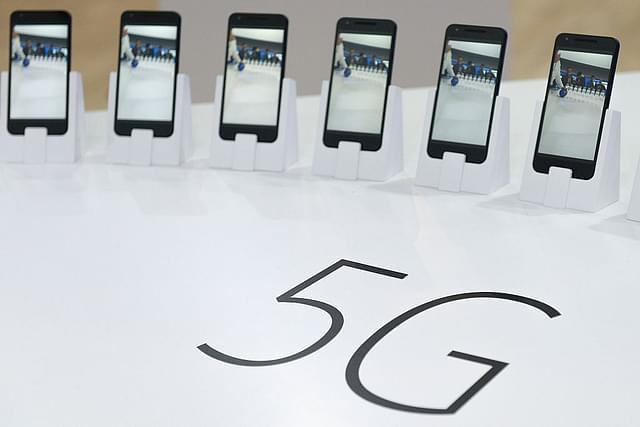 Mobile phones with 5G are displayed at the Mobile World Congress. (JOSEP LAGO/AFP/Getty Images)