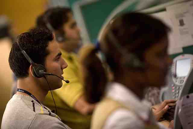 Operators take calls at a call-centre in Gurgaon. Representative Image. (FINDLAY KEMBER/AFP/GettyImages)