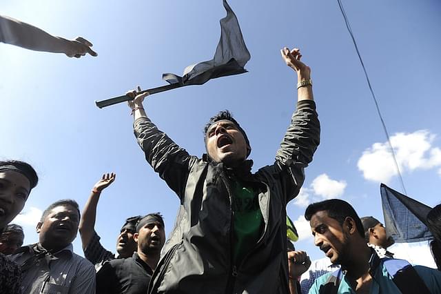 Nepalese activists from the Federal Alliance (members of the Madhesi and ethnic communities) chanting anti-constitution slogans. Photo credit: PRAKASH MATHEMA/AFP/Getty Images