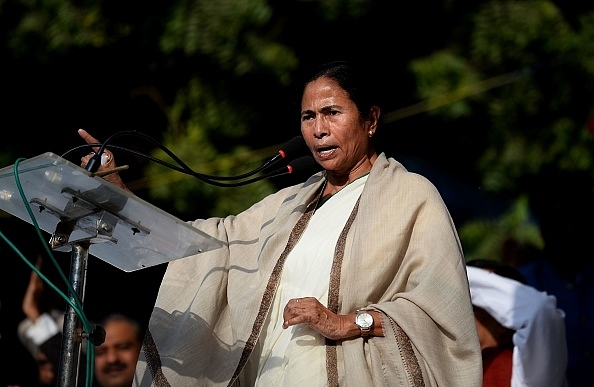 Mamata Banerjee delivers a speech during a protest against demonetisation in New Delhi on 23 November 2016. Photo credit: SAJJAD HUSSAIN/AFP/Getty Images