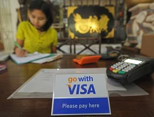 Visa 
electronic payment. Photo credit: Than 
WIN/AFP/GettyImages