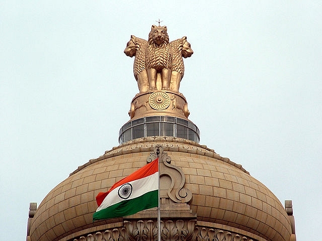 Indian flag and the State Emblem atop Vidhana Soudha in Bengaluru (Mellisa Anthony Jones/Wikimedia Commons)