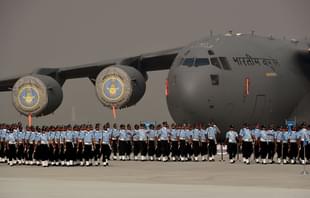 Indian Air Force
personnel march past a C-17 Globemaster during the Air Force Day parade on the
outskirts of New Delhi. Photo credit: MONEY SHARMA/AFP/GettyImages 