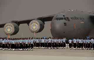 Indian Air Force
personnel march past a C-17 Globemaster during the Air Force Day parade on the
outskirts of New Delhi. Photo credit: MONEY SHARMA/AFP/GettyImages&nbsp;