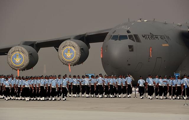 Indian Air Force
personnel march past a C-17 Globemaster during the Air Force Day parade on the
outskirts of New Delhi. Photo credit: MONEY SHARMA/AFP/GettyImages&nbsp;