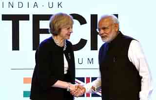 Britain’s Prime Minister Theresa May with her Indian counterpart Narendra Modi at The India-UK Tech Summit in New Delhi. Photo credit: PRAKASH SINGH/AFP/GettyImages