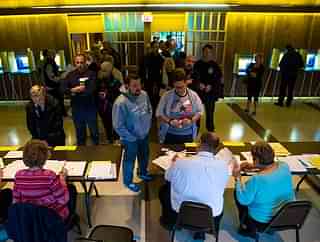 Voters queue up to cast
their ballot at Cannon Pavilion on 8 November in Milwaukee, Wisconsin. Photo credit:
 Darren Hauck/GettyImages&nbsp;&nbsp;