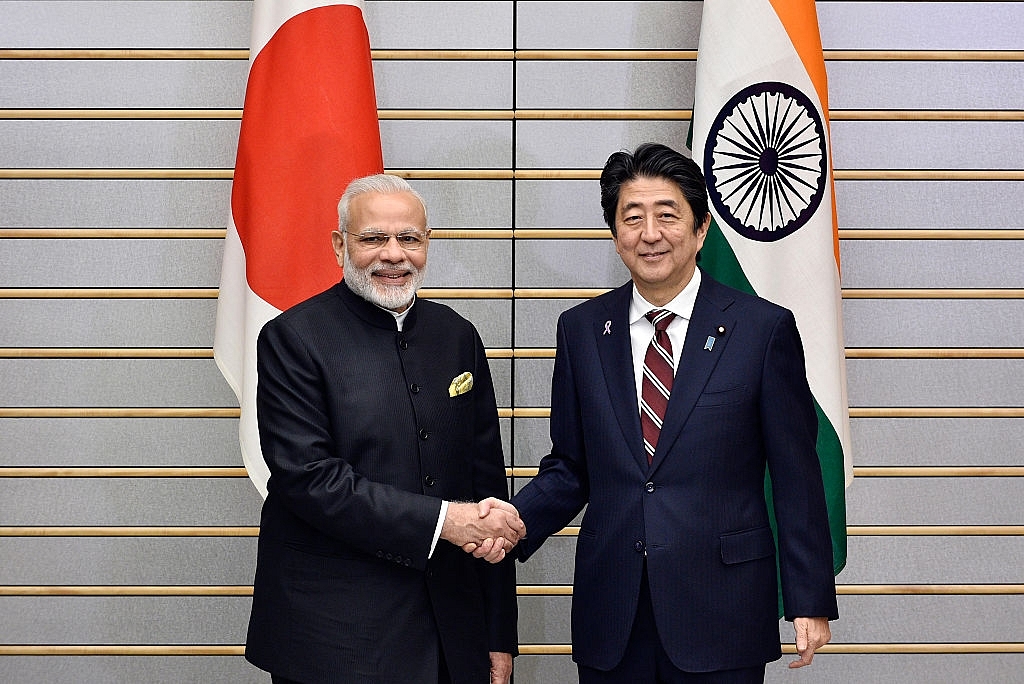 India’s Prime Minister Narendra Modi (L) and his Japanese counterpart Shinzo Abe in Tokyo (FRANCK ROBICHON/AFP/Getty Images)